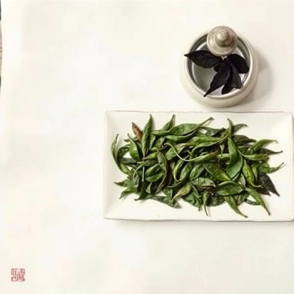 Spent tea leaves spread open on a white porcelain plate beside an open gaiwan lid, soft ink wash illustration